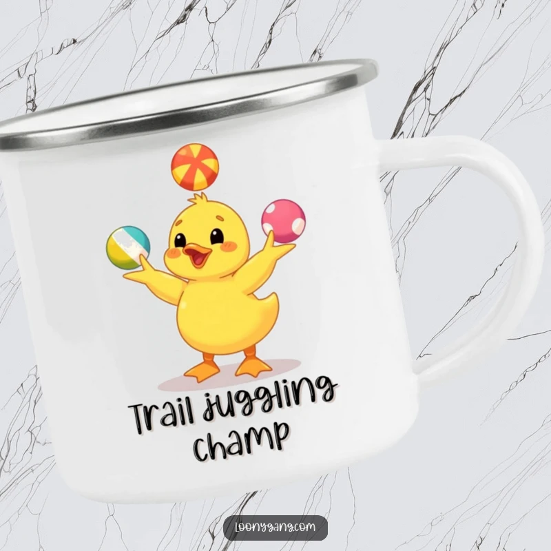 Funny yellow duckling camping mug depicting a happy duckling juggling balls, perfect for outdoor fun and a humorous touch. Sturdy and cute.