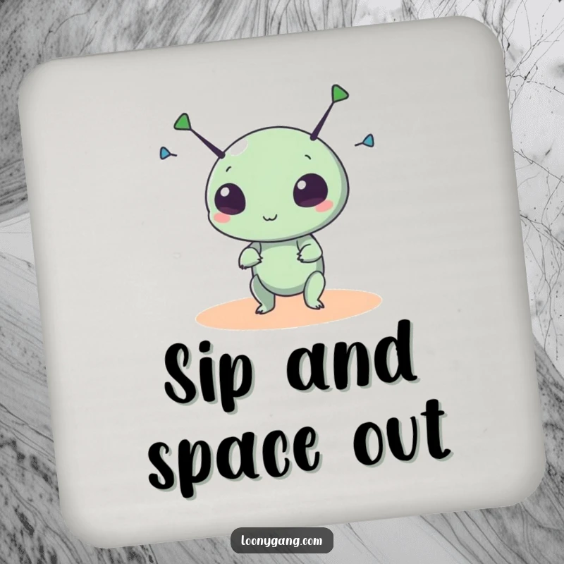 Funny alien coaster featuring a small, round creature spinning its antennae wildly, protecting surfaces with cosmic humor.