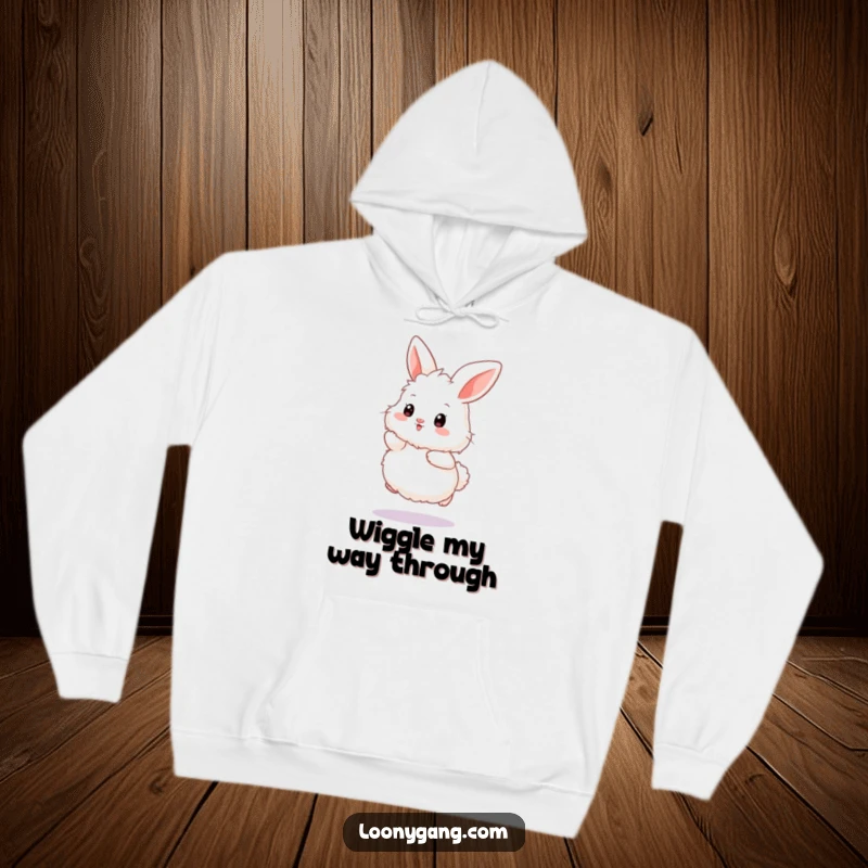 Funny bunny hoodie depicting a fluffy white rabbit in a hilarious, exaggerated wiggle hop, perfect for cozy laughter.