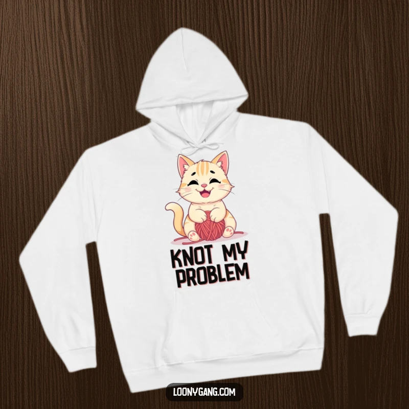 Funny hoodie design of a mischievous cat happily tangled in yarn, cozy and humorous apparel, great funny gift.