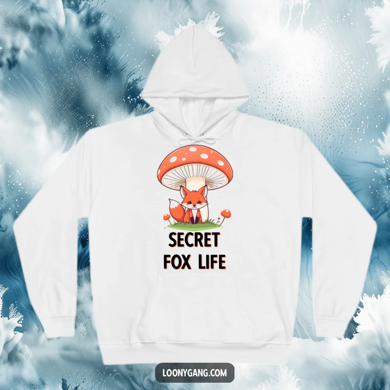 Funny fox hoodie showcasing a red fox peeking from behind a giant, comical mushroom, offering warmth and whimsical charm. Ideal for casual wear and funny gift occasions.
