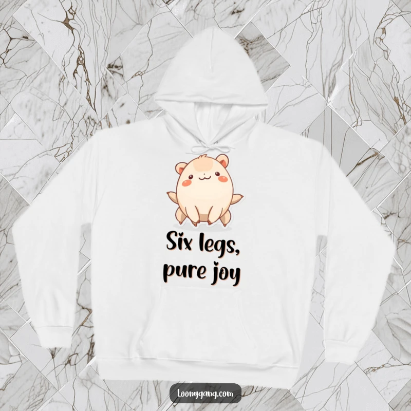 Funny creature with six short legs smiling and wiggling rhythmically, cozy hoodie for fun.