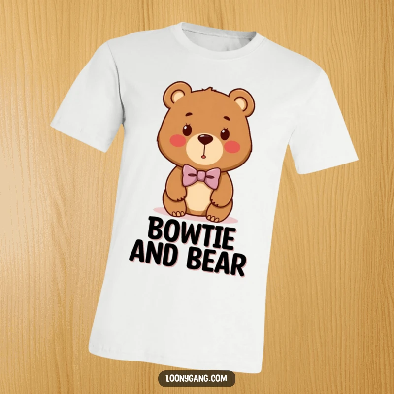 Funny bear cub t-shirt showcasing a cute brown bear with a ridiculously lopsided bowtie, embodying playful fashion.