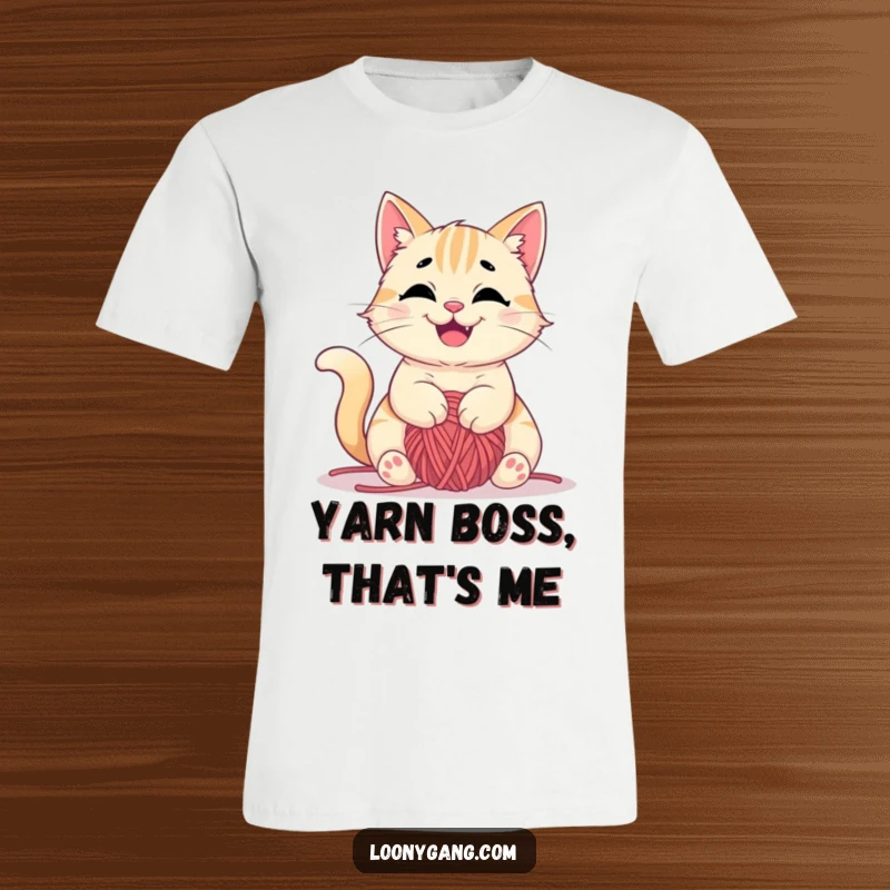 Funny t-shirt graphic of a mischievous cat happily tangled in yarn, playful and cute, ideal funny gift.