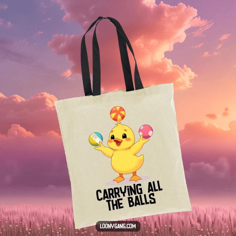 Funny yellow duckling tote bag depicting a happy duckling mastering the art of juggling colorful balls. A charming and useful gift.