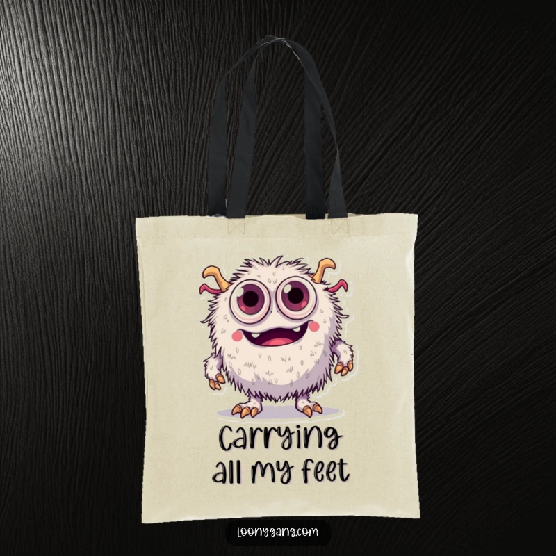 Funny fuzzy monster with too many eyes comically tripping over its feet, printed on a durable tote bag.