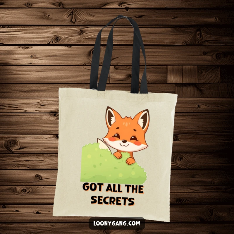 Funny Fox Tote Bag with a sly fox peeking from a bush, perfect for carrying items with a humorous and intriguing woodland theme.